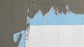 Armierung - Wall Isolierung styrofoam, mesh und Stößel - Stock-Fotografie